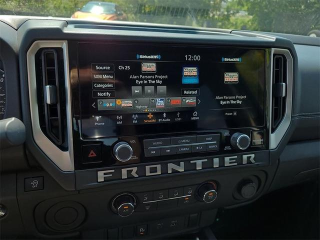 Photo of 2026 Glacier White Nissan Frontier