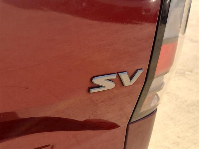 Photo of 2024 Cardinal Red Metallic Nissan Frontier