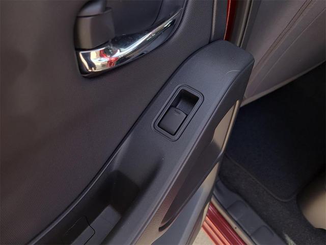 Photo of 2024 Cardinal Red Metallic Nissan Frontier