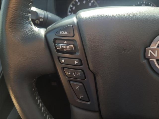 Photo of 2024 Cardinal Red Metallic Nissan Frontier