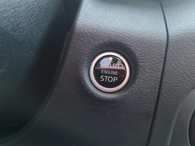 Photo of 2024 Cardinal Red Metallic Nissan Frontier