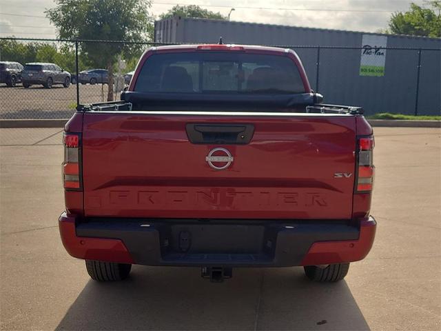 Photo of 2024 Cardinal Red Metallic Nissan Frontier