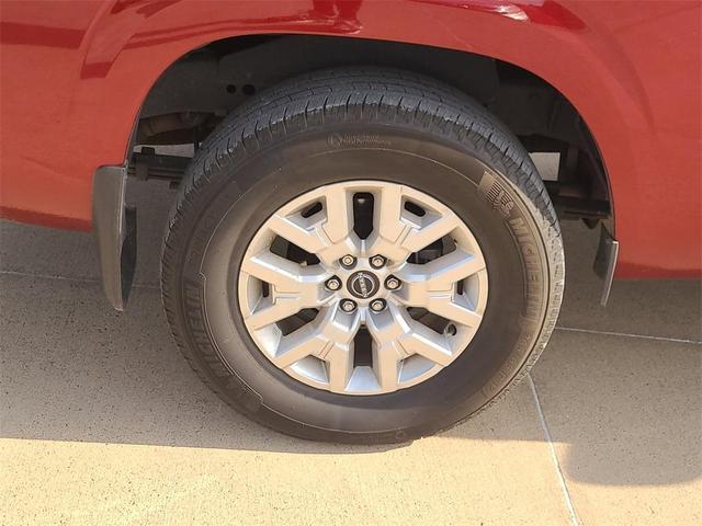 Photo of 2024 Cardinal Red Metallic Nissan Frontier