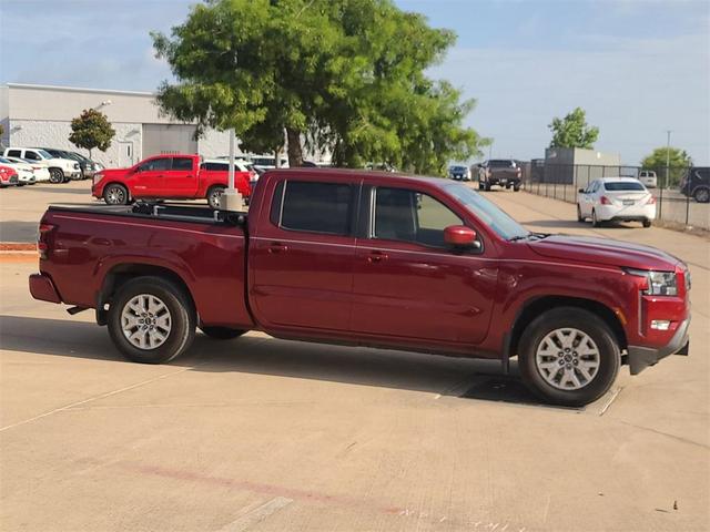 Photo of 2024 Cardinal Red Metallic Nissan Frontier