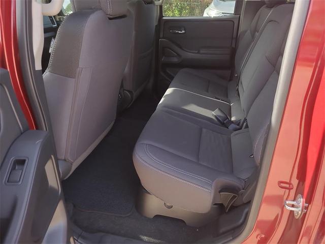 Photo of 2024 Cardinal Red Metallic Nissan Frontier
