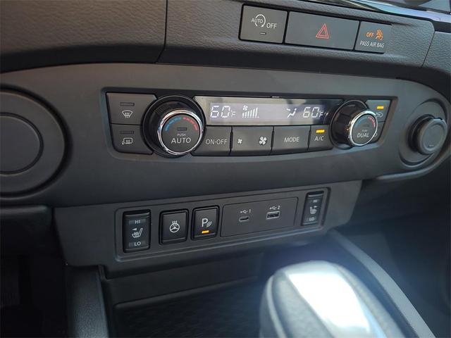 Photo of 2024 Cardinal Red Metallic Nissan Frontier