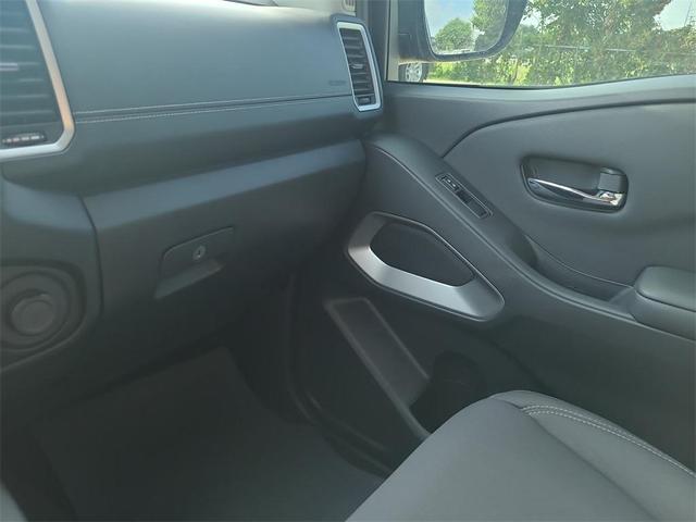 Photo of 2024 Cardinal Red Metallic Nissan Frontier