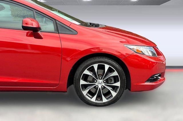 Photo of 2013 Sunburst Orange Pearl Honda Civic