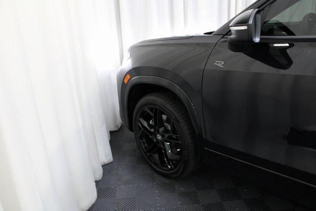 Photo of 2025 Deep Black Pearl Volkswagen Tiguan