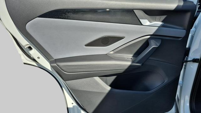 Photo of 2025 Opal White w/Deep Black Roof Volkswagen Tiguan