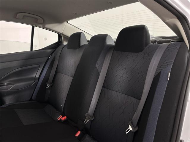 Photo of 2025 Aspen White Tricoat Nissan Versa