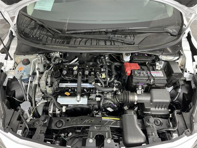 Photo of 2025 Aspen White Tricoat Nissan Versa