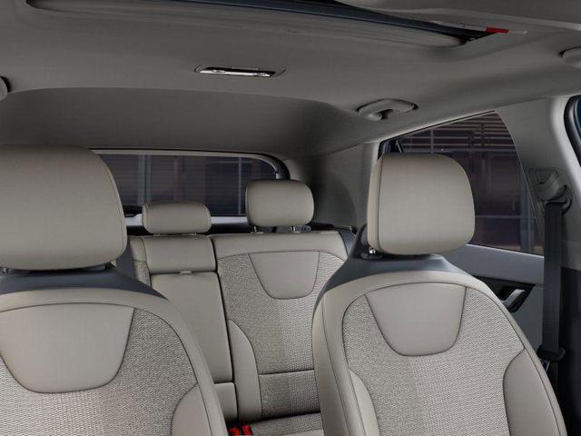 Photo of 2025 Mineral Blue Kia Niro