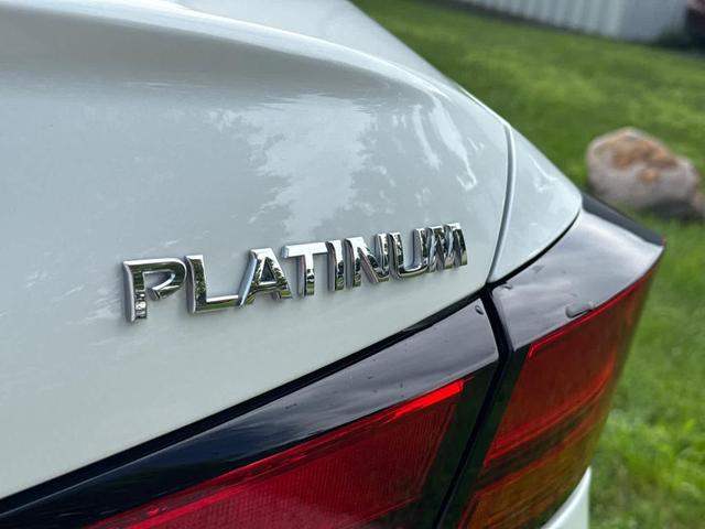 Photo of 2022 Pearl White Tricoat Nissan Altima