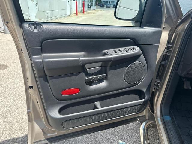 Photo of 2003 Light Almond Pearl Met CC/Bright Silver Met CC Dodge Ram 1500