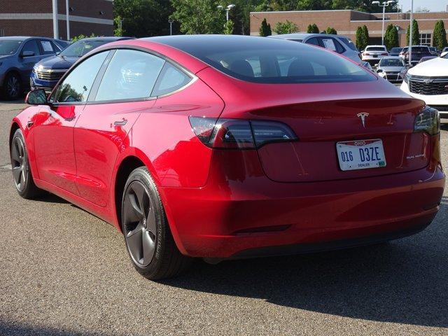 Photo of 2022 Red Multi Tesla Model 3
