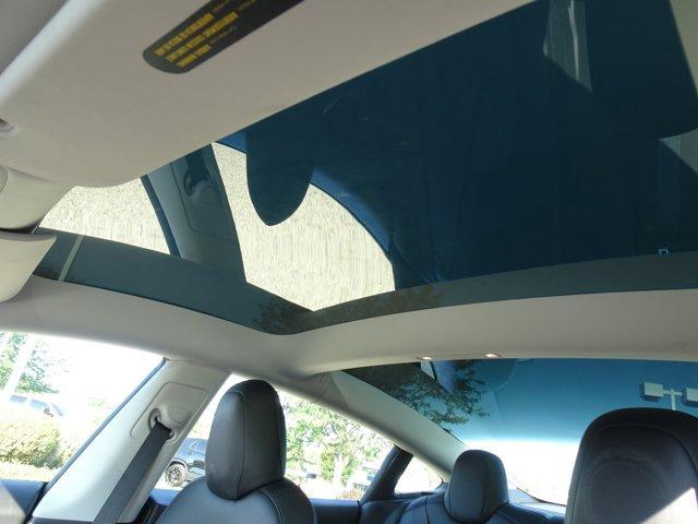 Photo of 2022 Red Multi Tesla Model 3