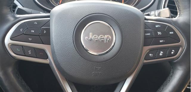 Photo of 2019 Bright White Clearcoat Jeep Cherokee