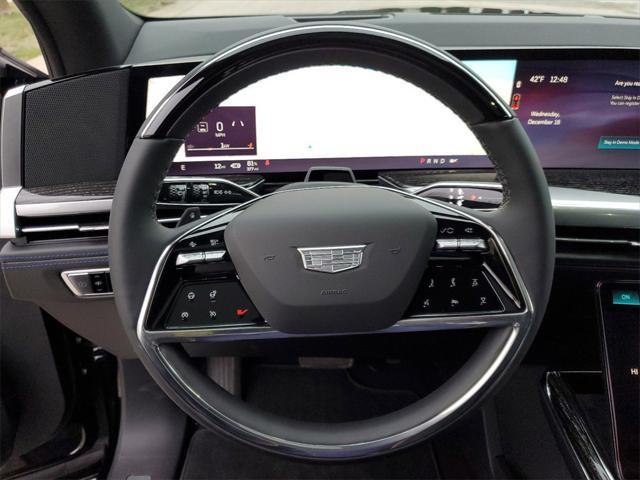 Photo of 2025 Black Raven Cadillac Escalade IQ