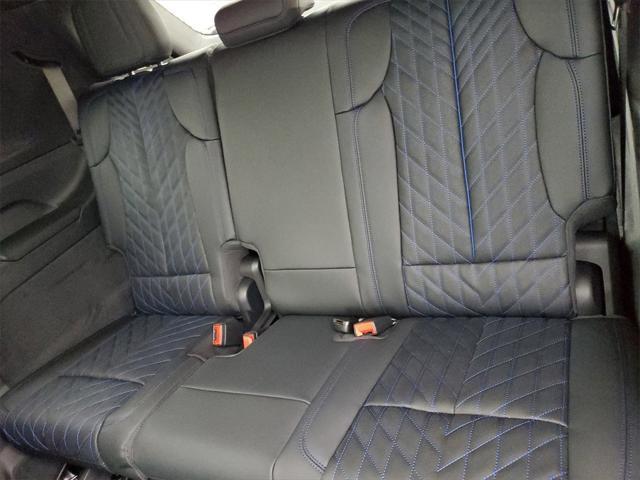 Photo of 2025 Black Raven Cadillac Escalade IQ
