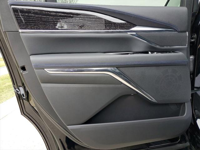Photo of 2025 Black Raven Cadillac Escalade IQ