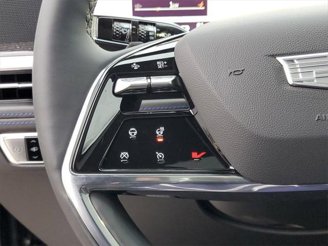 Photo of 2025 Black Raven Cadillac Escalade IQ