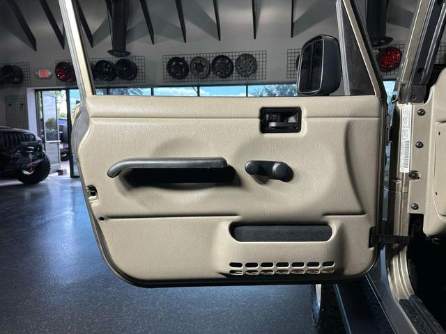 Photo of 2006 Tan Jeep Wrangler