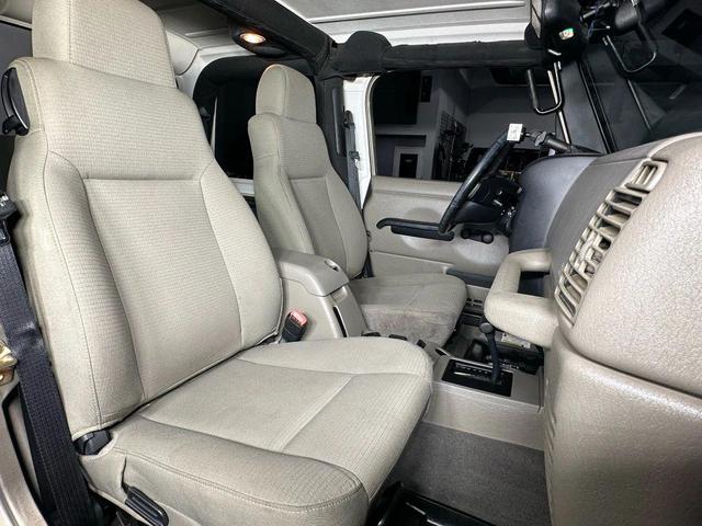 Photo of 2006 Tan Jeep Wrangler