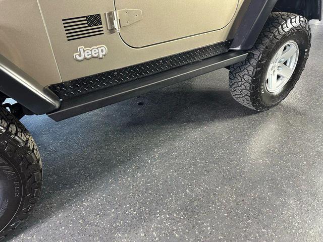 Photo of 2006 Tan Jeep Wrangler