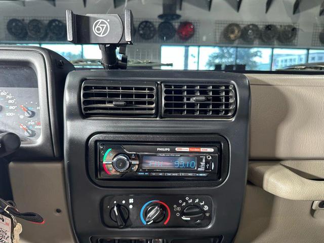 Photo of 2006 Tan Jeep Wrangler