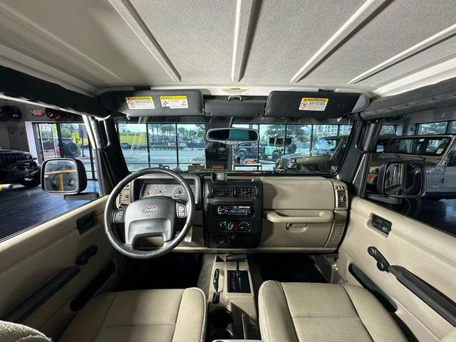 Photo of 2006 Tan Jeep Wrangler