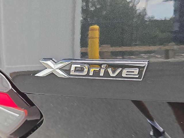 Photo of 2024 Black Sapphire Metallic BMW 230