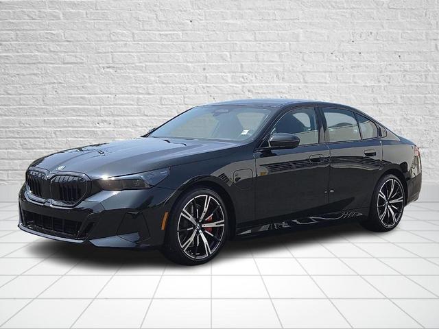 Photo of 2026 Black Sapphire Metallic BMW 550e