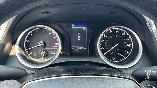 Photo of 2024 Midnight Black Toyota Camry