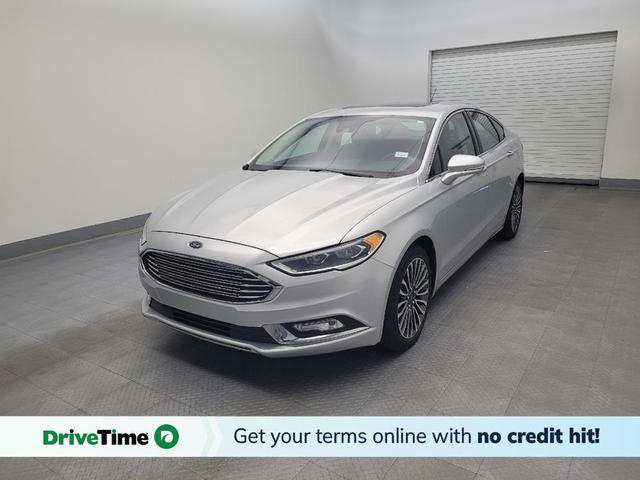 Photo of 2017 Ruby Red Metallic Tinted Clearcoat Ford Fusion