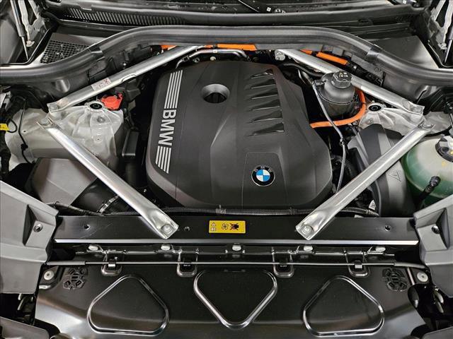 Photo of 2026 Mineral White Metallic BMW X5 PHEV