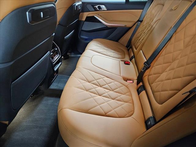 Photo of 2026 Manhattan Green Metallic BMW X5