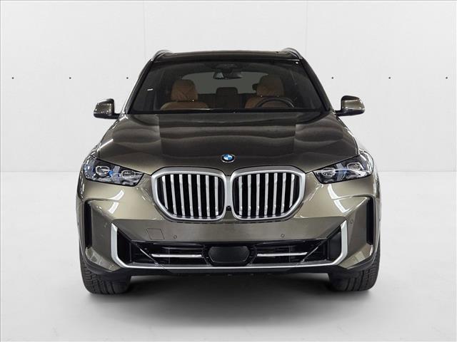 Photo of 2026 Manhattan Green Metallic BMW X5