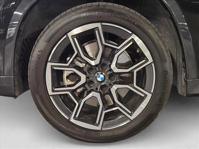 Photo of 2024 Black Sapphire Metallic BMW X1