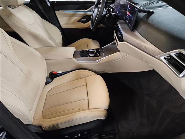 Photo of 2025 Black Sapphire Metallic BMW i4 Gran Coupe