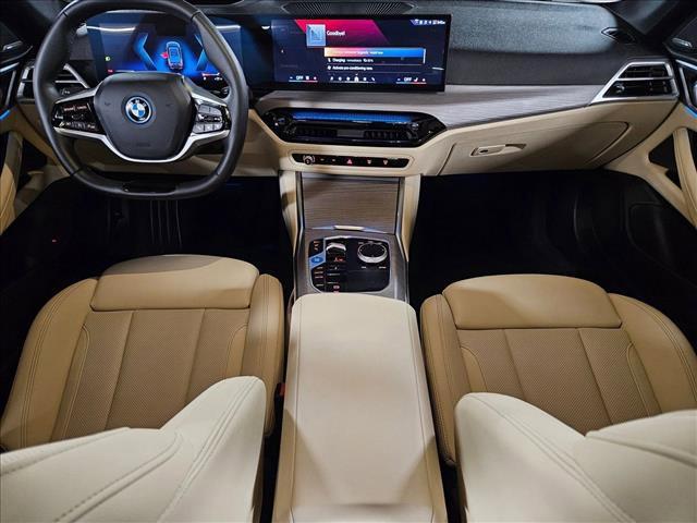 Photo of 2025 Black Sapphire Metallic BMW i4 Gran Coupe