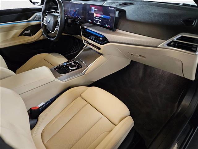 Photo of 2025 Black Sapphire Metallic BMW i4 Gran Coupe