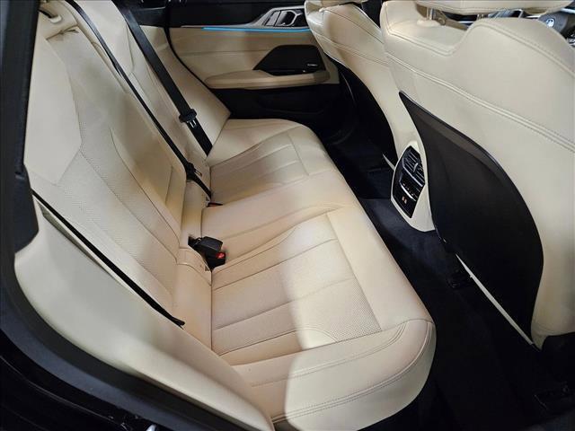 Photo of 2025 Black Sapphire Metallic BMW i4 Gran Coupe