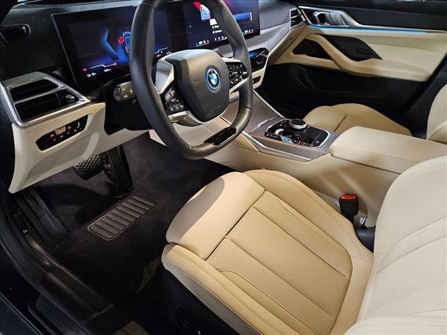 Photo of 2025 Black Sapphire Metallic BMW i4 Gran Coupe