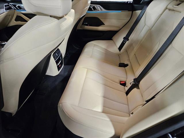 Photo of 2025 Black Sapphire Metallic BMW i4 Gran Coupe