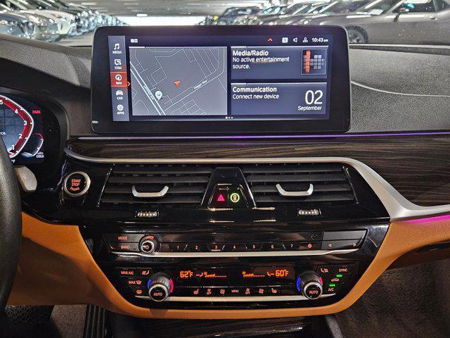 Photo of 2023 Black Sapphire Metallic BMW 540