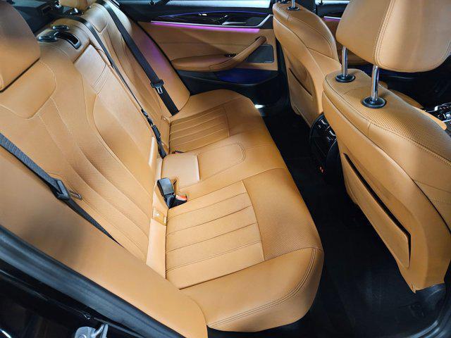 Photo of 2023 Black Sapphire Metallic BMW 540