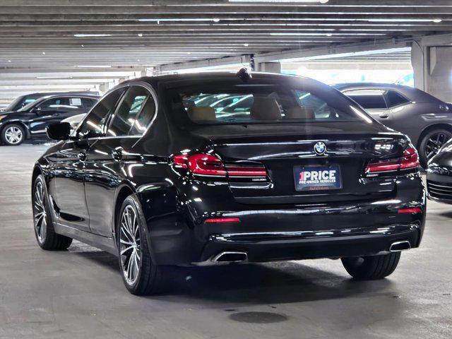 Photo of 2023 Black Sapphire Metallic BMW 540