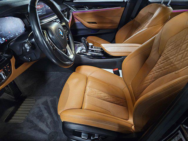 Photo of 2023 Black Sapphire Metallic BMW 540