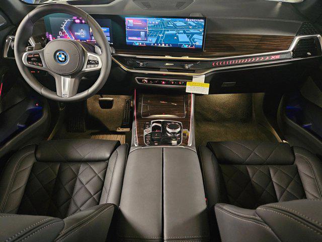 Photo of 2026 Frozen Pure Grey Metallic BMW X5 PHEV